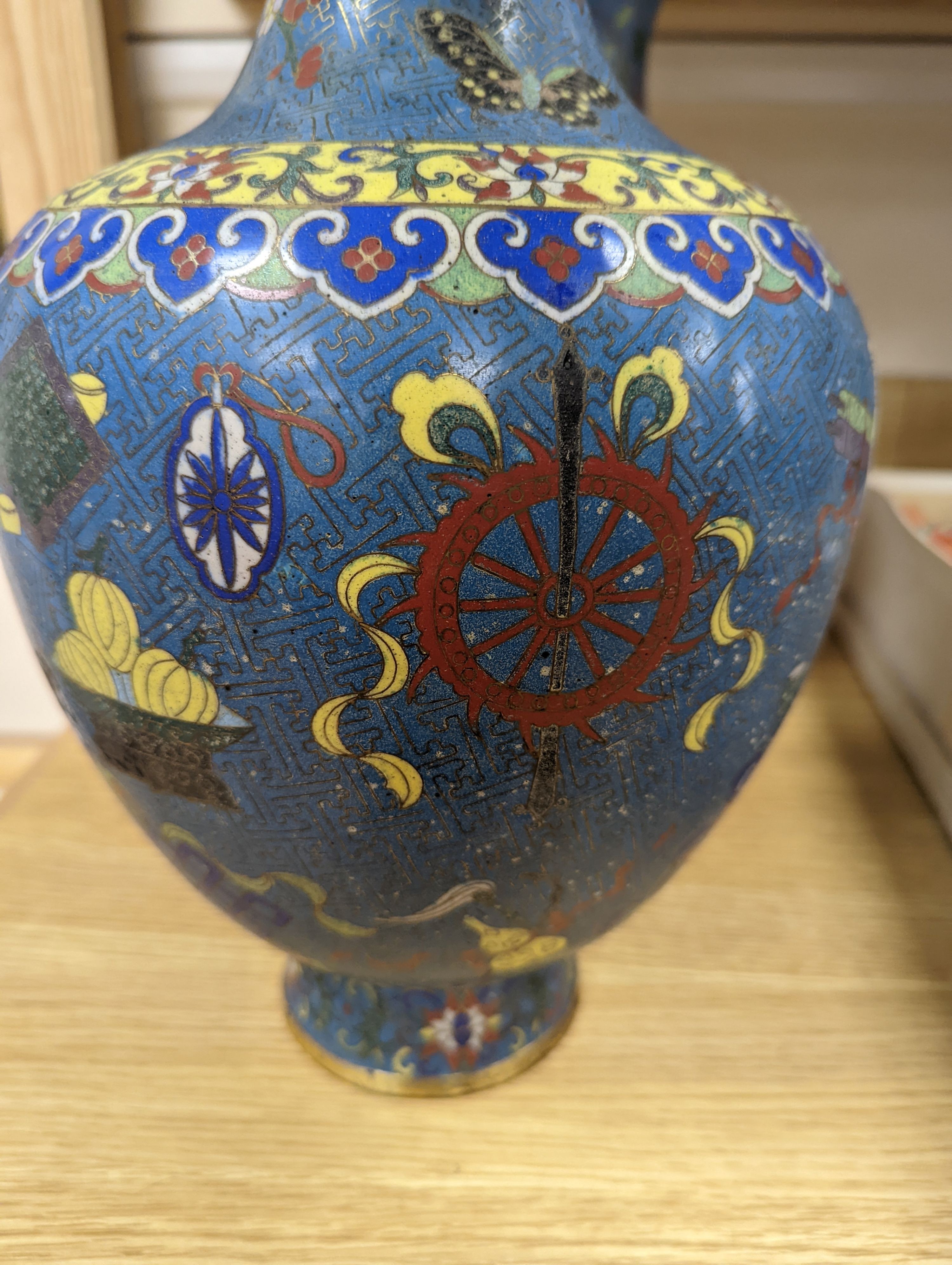 A pair of late 19th/early 20th century Chinese cloisonné enamel ‘Buddhist emblems’ vases 36cm